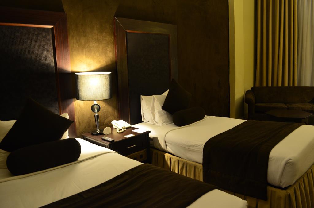 Smart Hotel Lahore Habitación foto