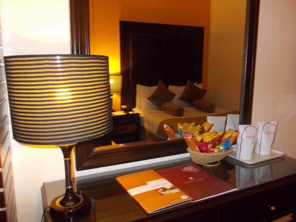 Smart Hotel Lahore Habitación foto